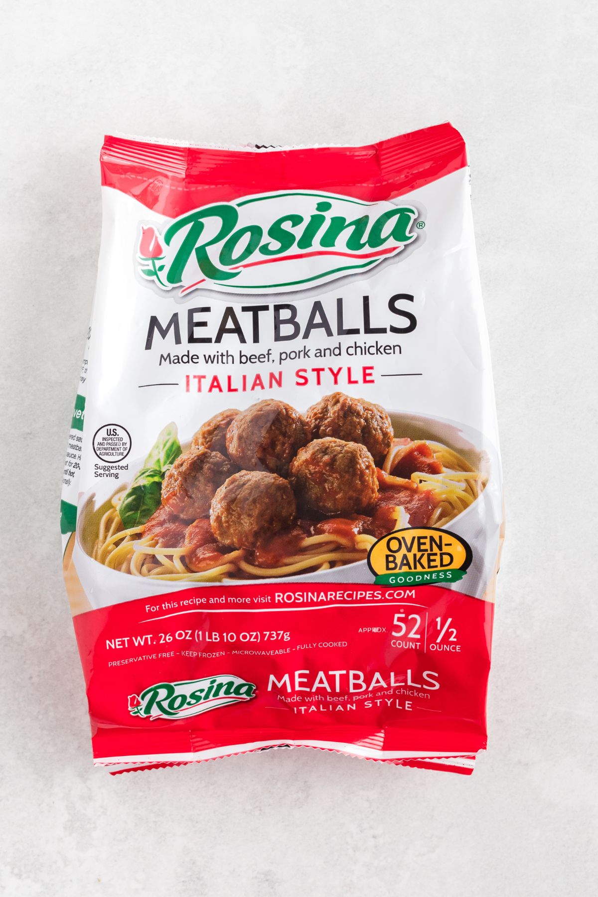 Bag of frozen meatballs on a marble table. 