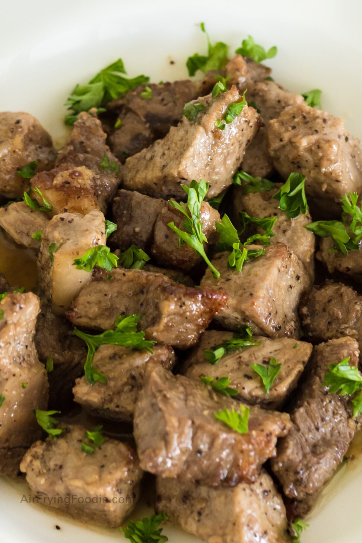 Garlic steak bites tossed in a garlic butter sauce before serving. 