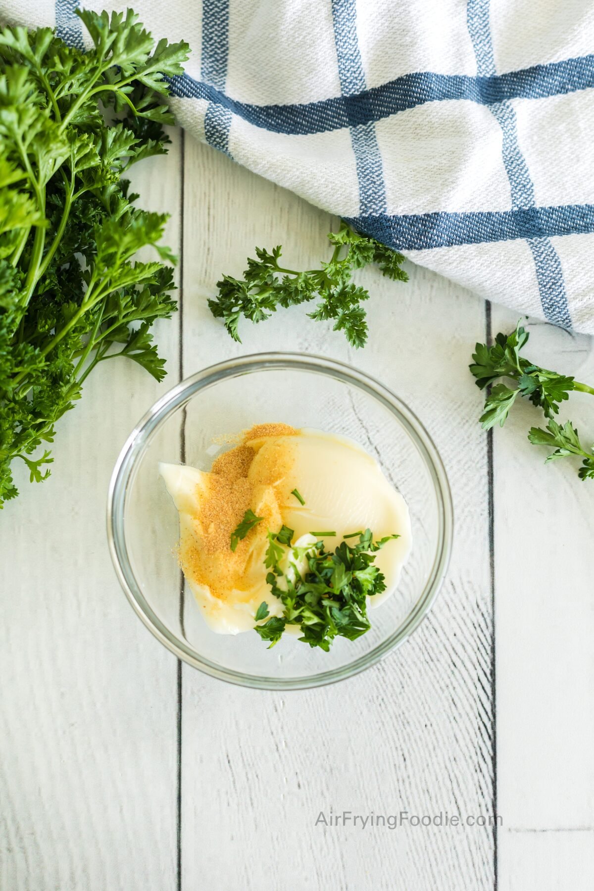 Garlic, butter, and fresh chopped parsley for a garlic butter sauce to use with the steak bites. 