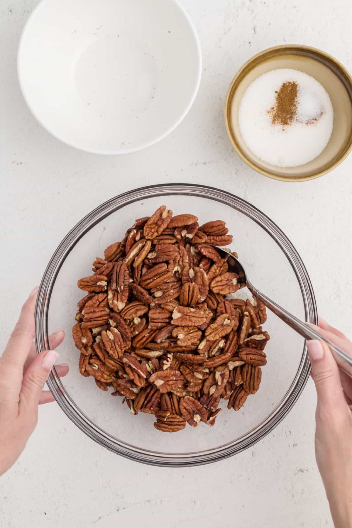 pecans mixed into the egg whites mixture until fully coated. 