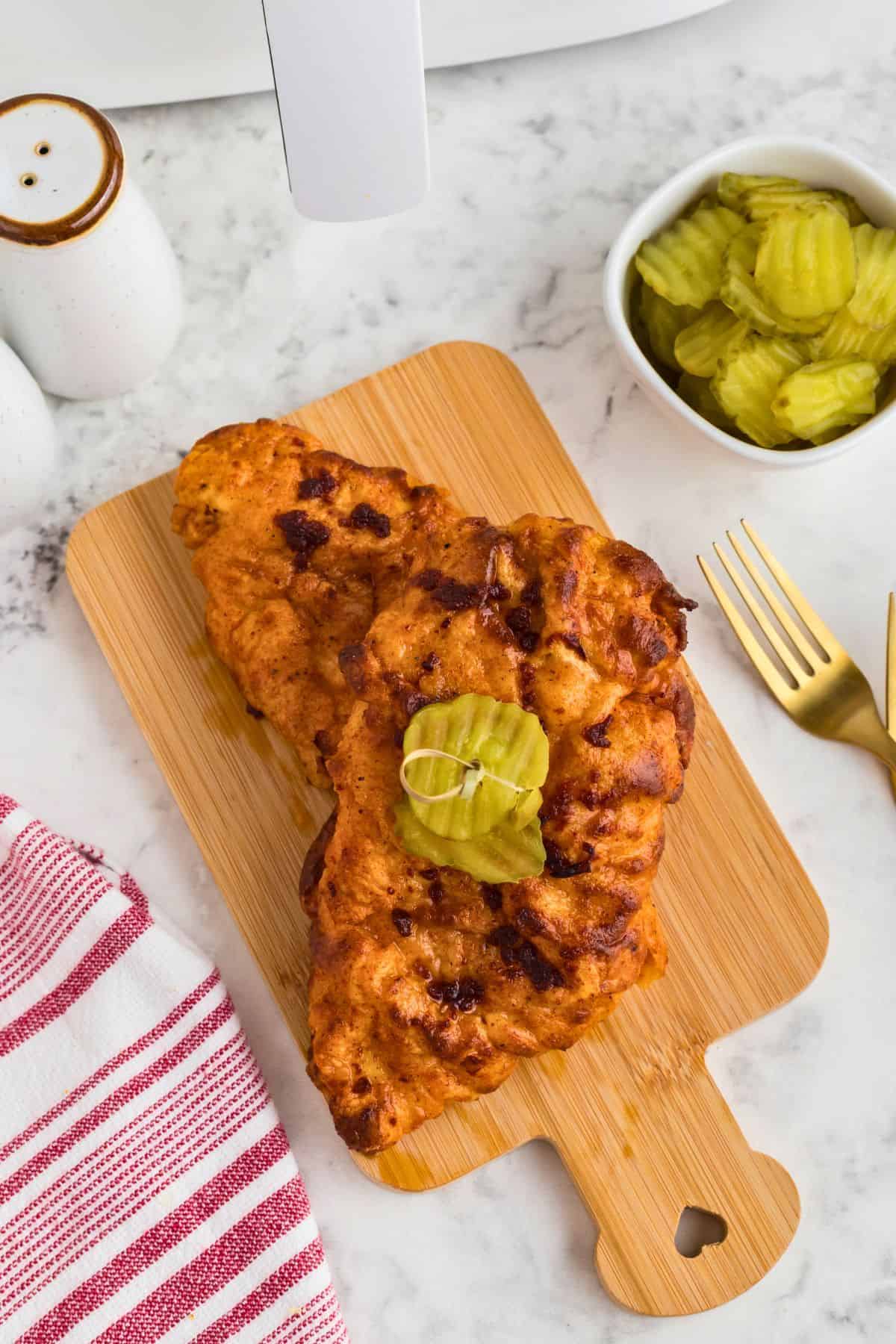 Air fryer Nashville Hot Chicken on a white plate.