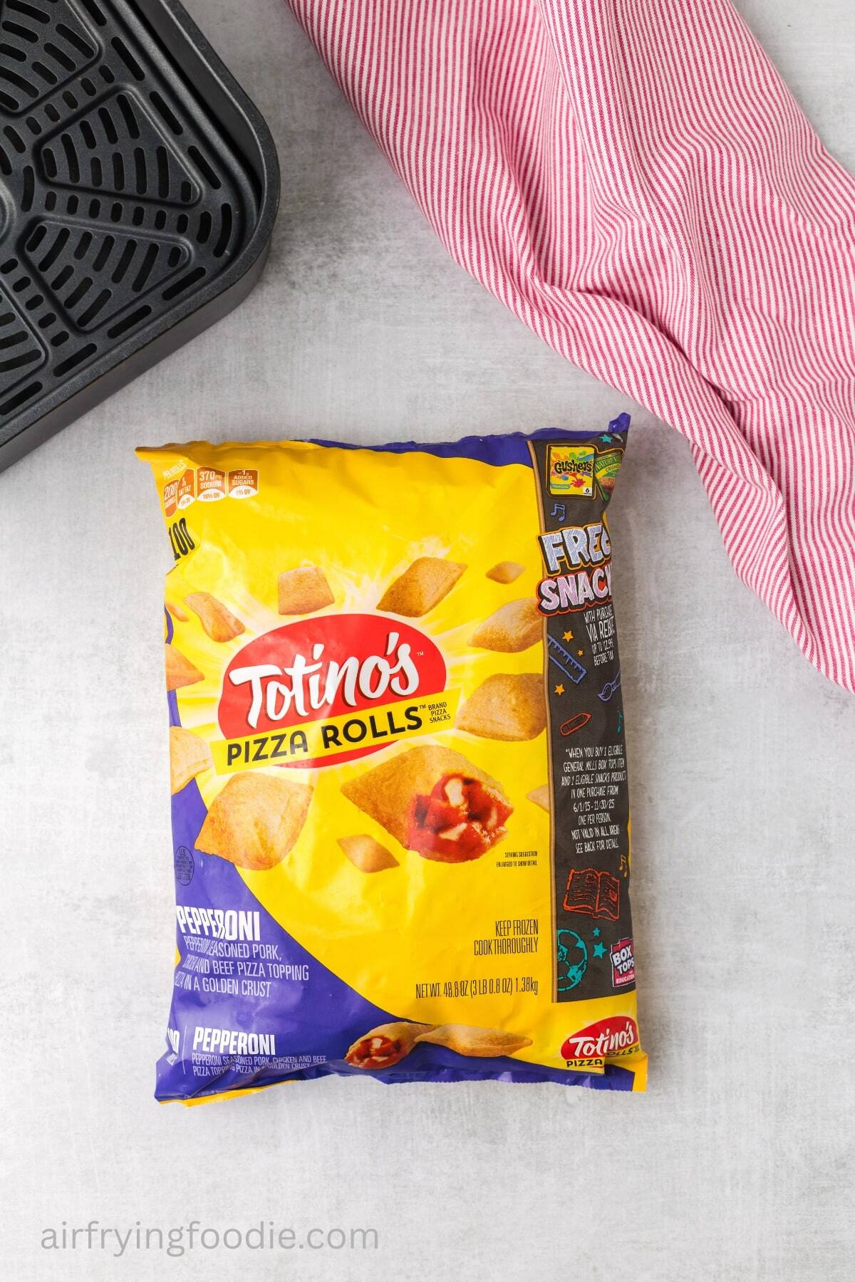A package of Totino's pizza rolls on a kitchen counter.