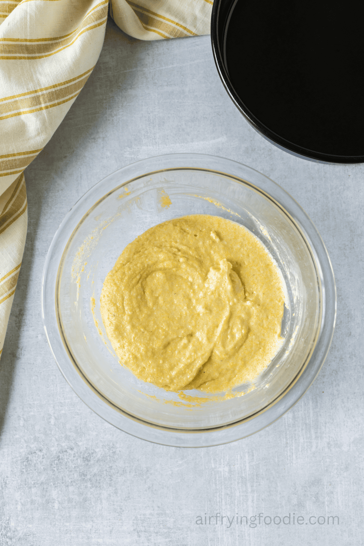 Cornbread batter mixed in a bowl.