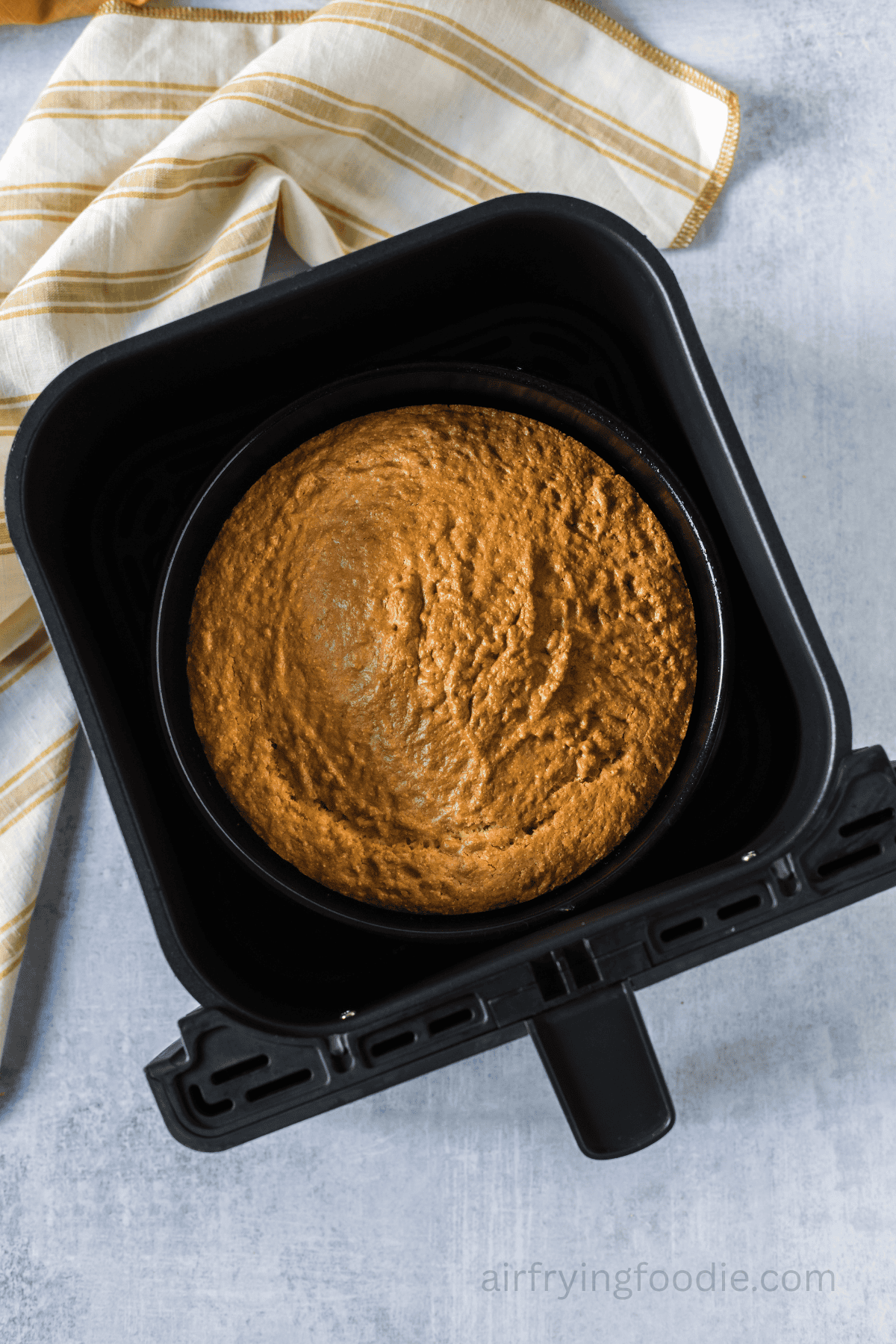 Air fryer cornbread cooked in the basket.