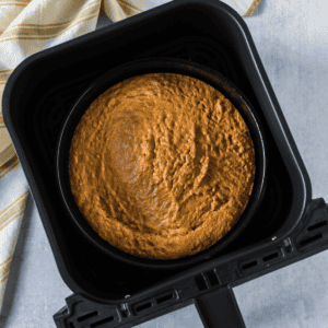 Air fryer cornbread in the basket after cooking.