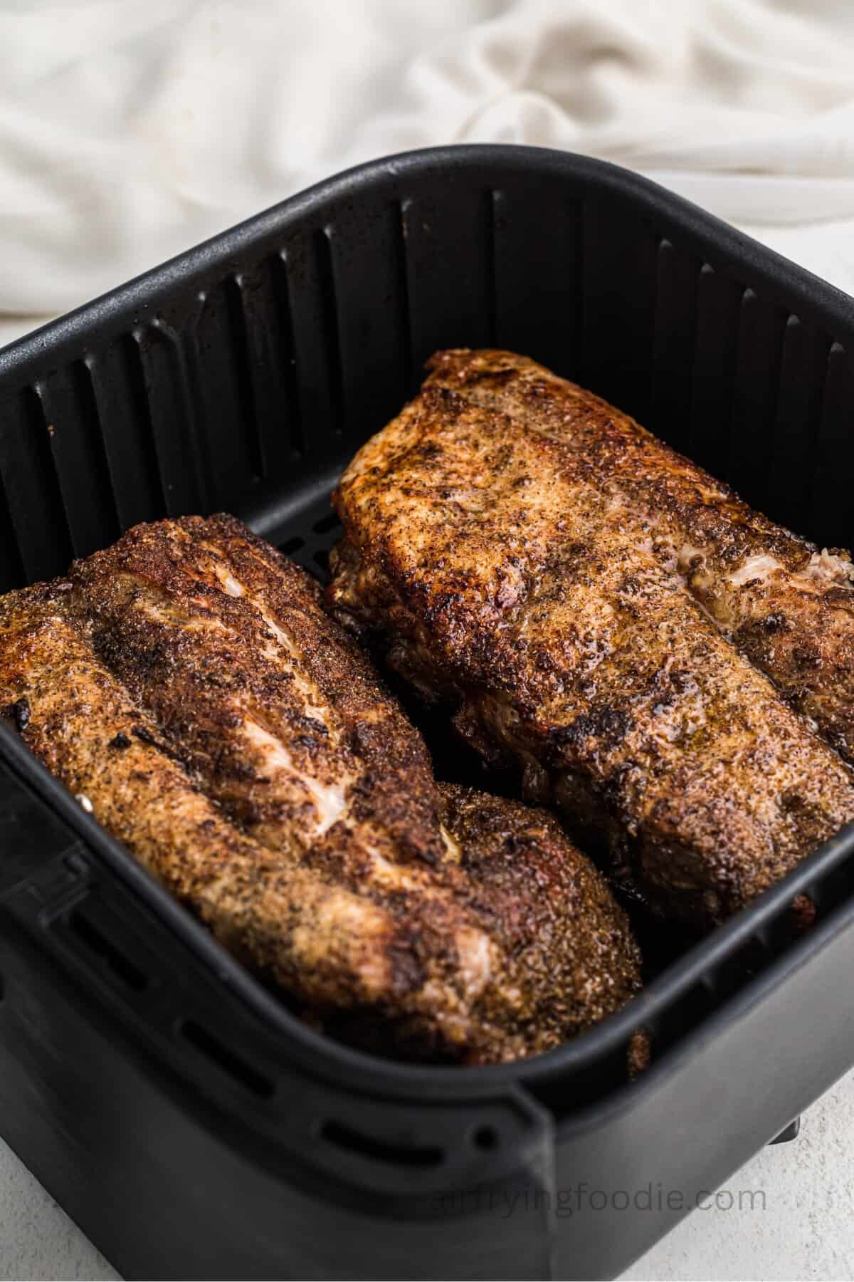 Air fryer BBQ ribs after cooking without BBQ sauce.